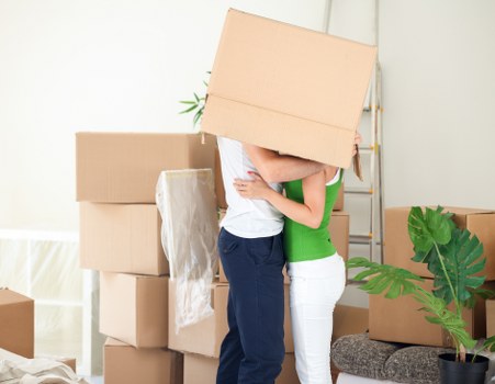 Local moving truck handling boxes and furniture near Plumstead homes