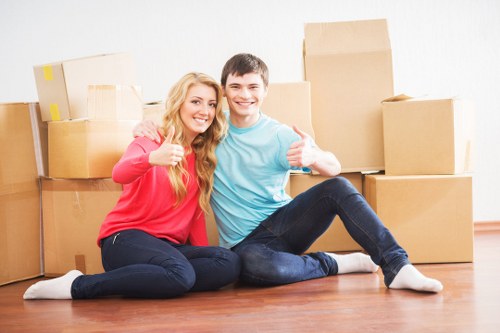 Furniture and household items being loaded into a removal van